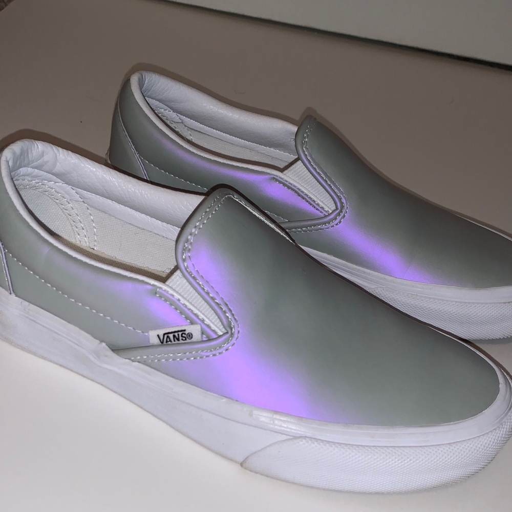 Grey vans that turn purple in light